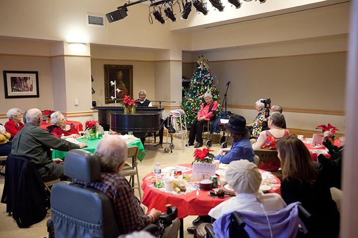 Residents enjoy a sing-a-long anytime, especially during the holidays! | Photo by Claudio Papapietro 