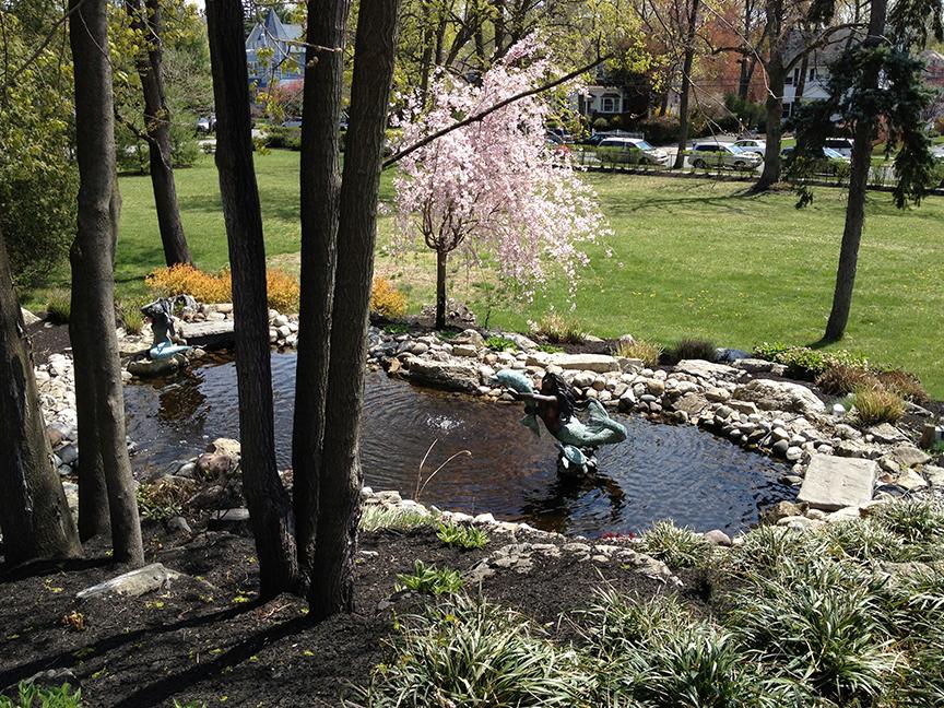 A pond and a fountain await your discovery on a spring stroll at the Home. | Photo by Lou Manna