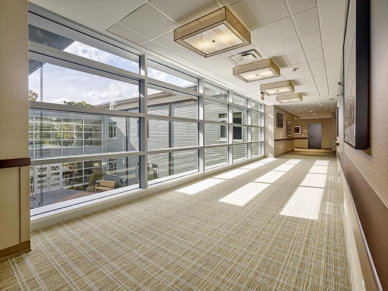The building was designed to maximize natural lighting through expansive windows with views of the six-acre campus. | Photo by Don Pearse Photographers, Inc.