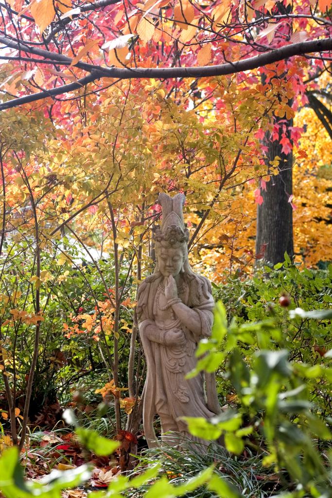 Discover delightful statues on a walk in our gardens. | Photo by Joann Coates